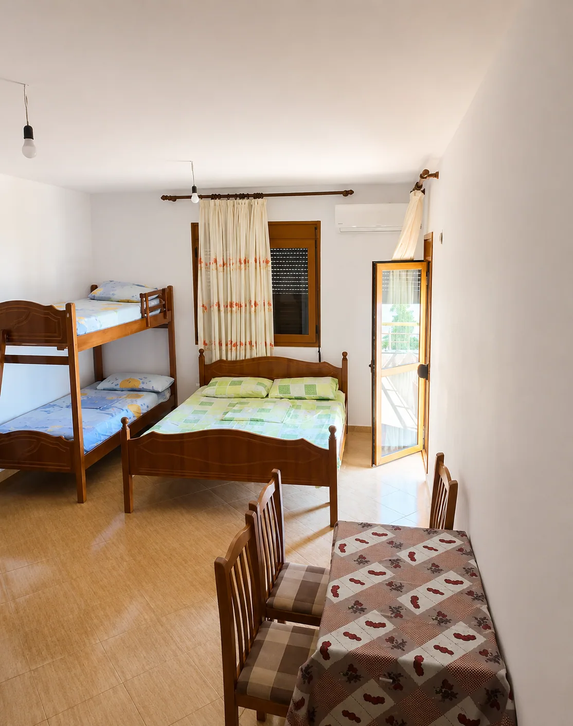 Bright studio with balcony door and air conditioning