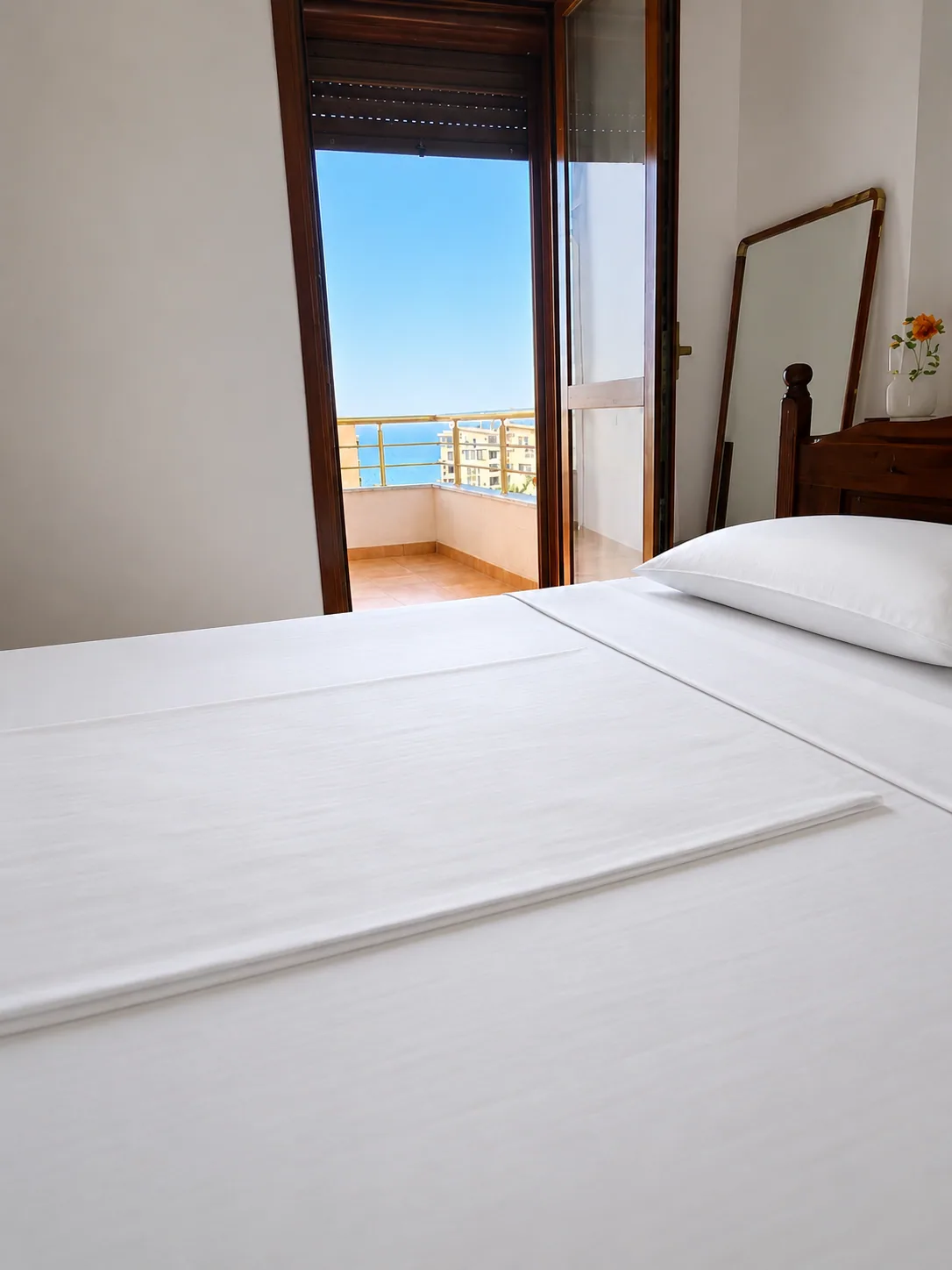 Double bed with balcony and sea view