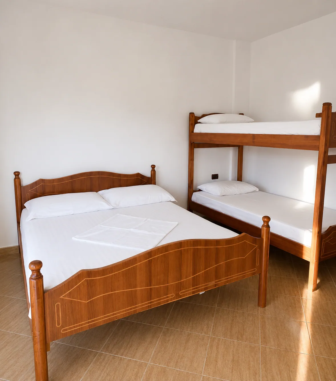 Family room with fresh white linen and bunk bed