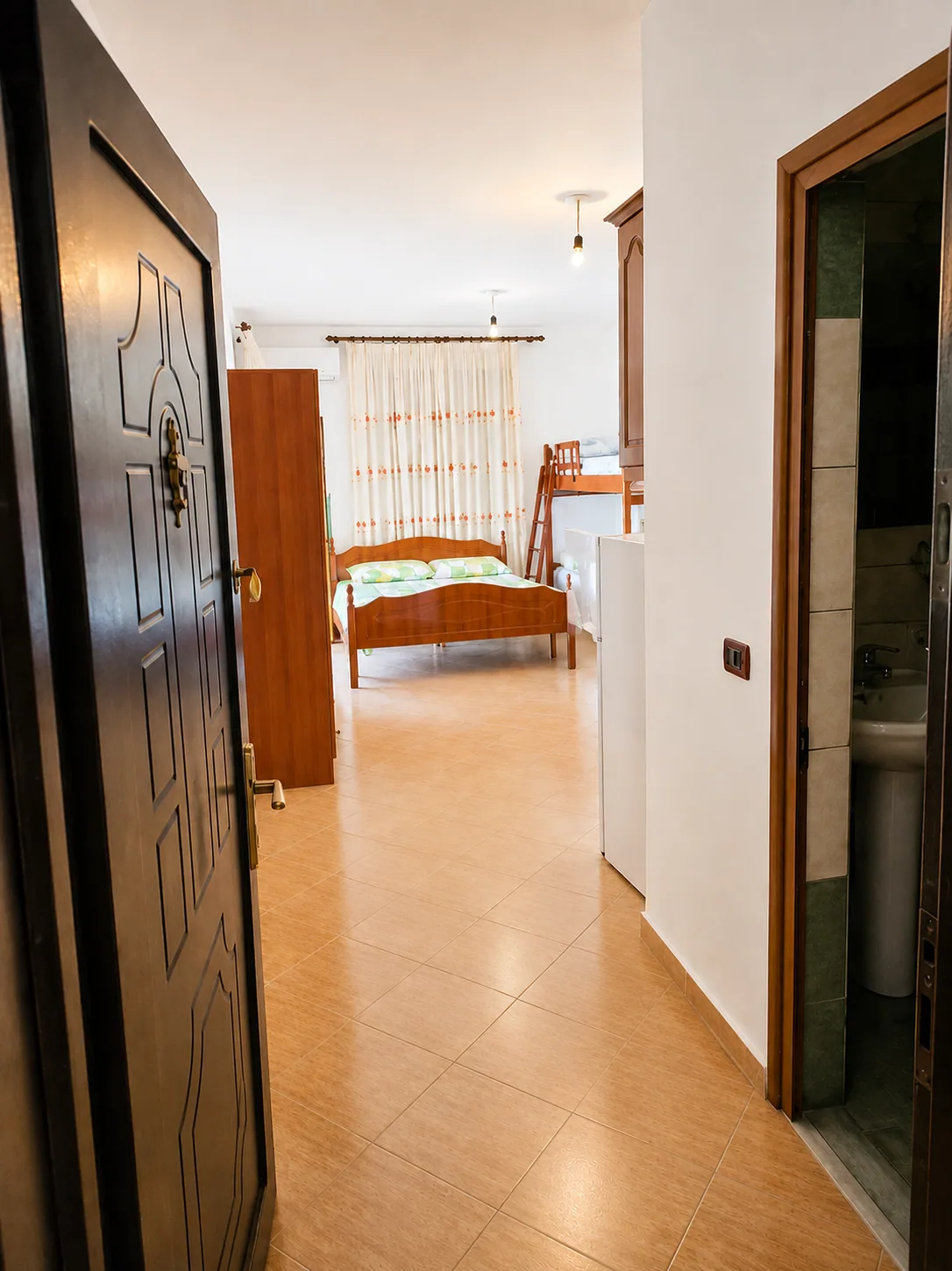 Apartment entry leading into the studio room