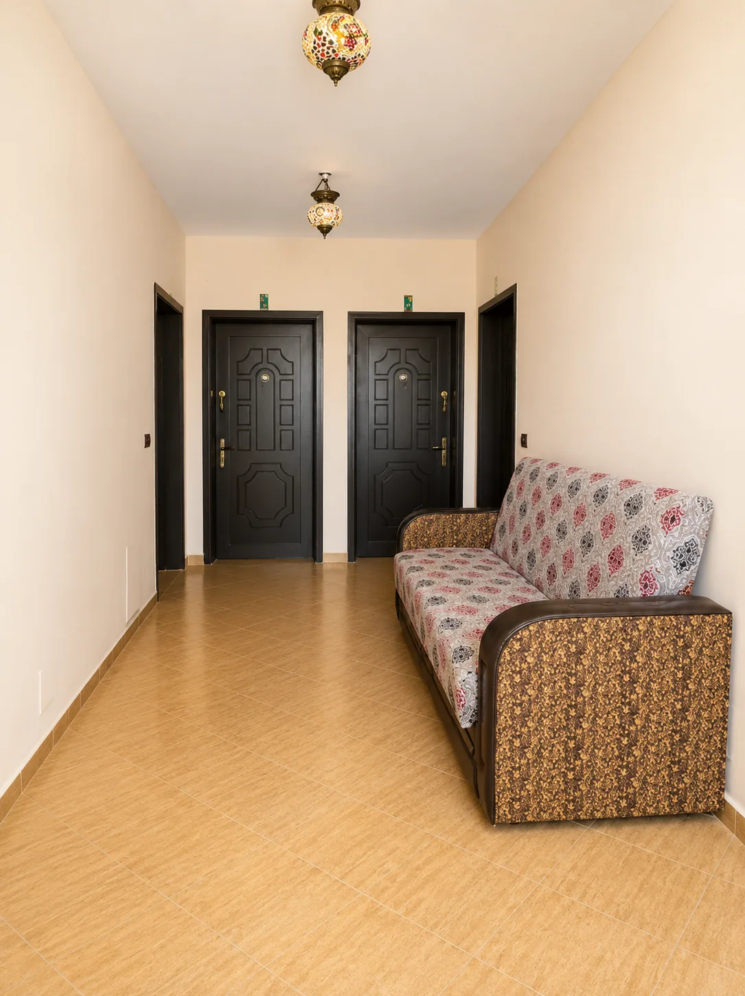 Upper-floor corridor outside the apartments